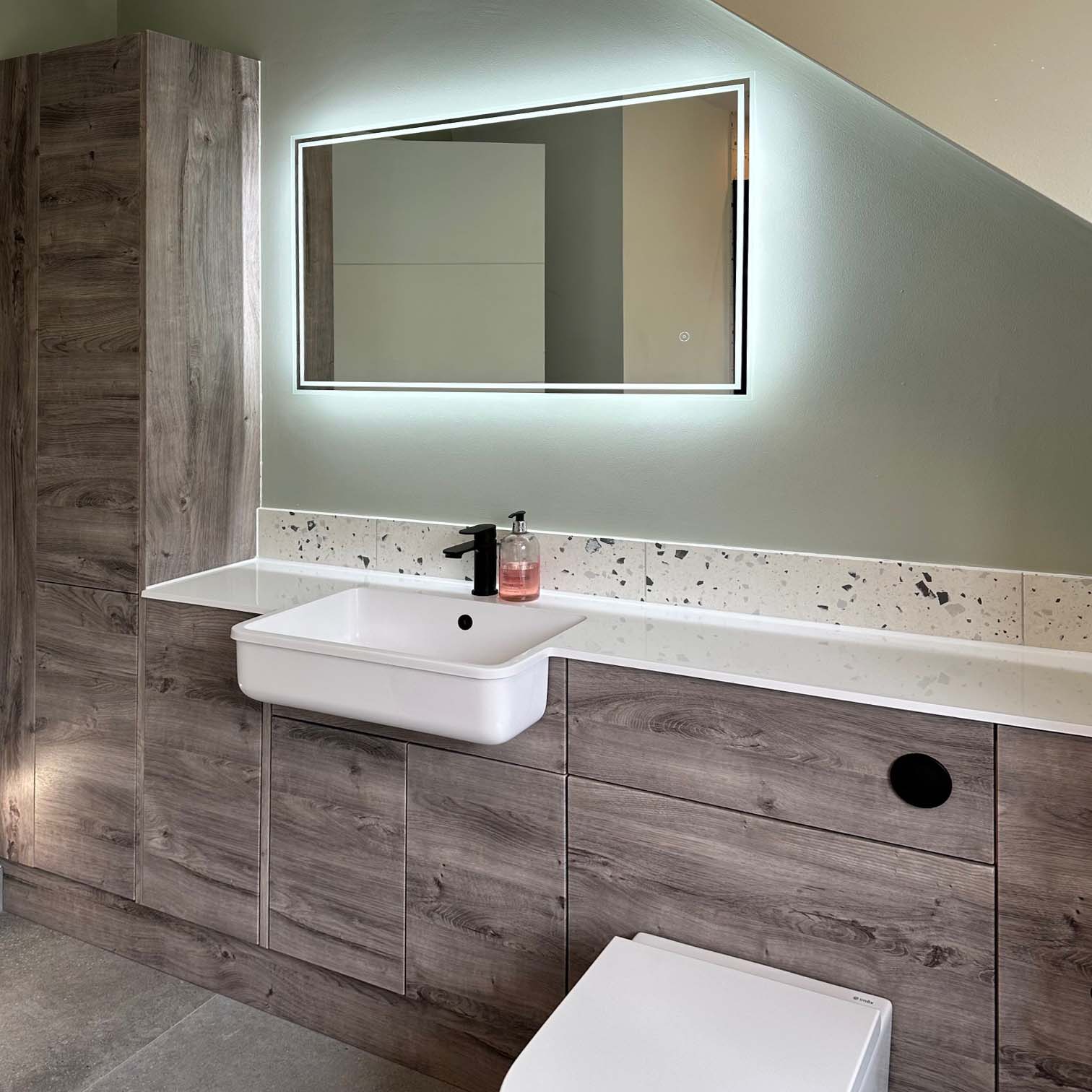 Halton Property Service; Illuminated Bathroom Mirror, Basin & Storage