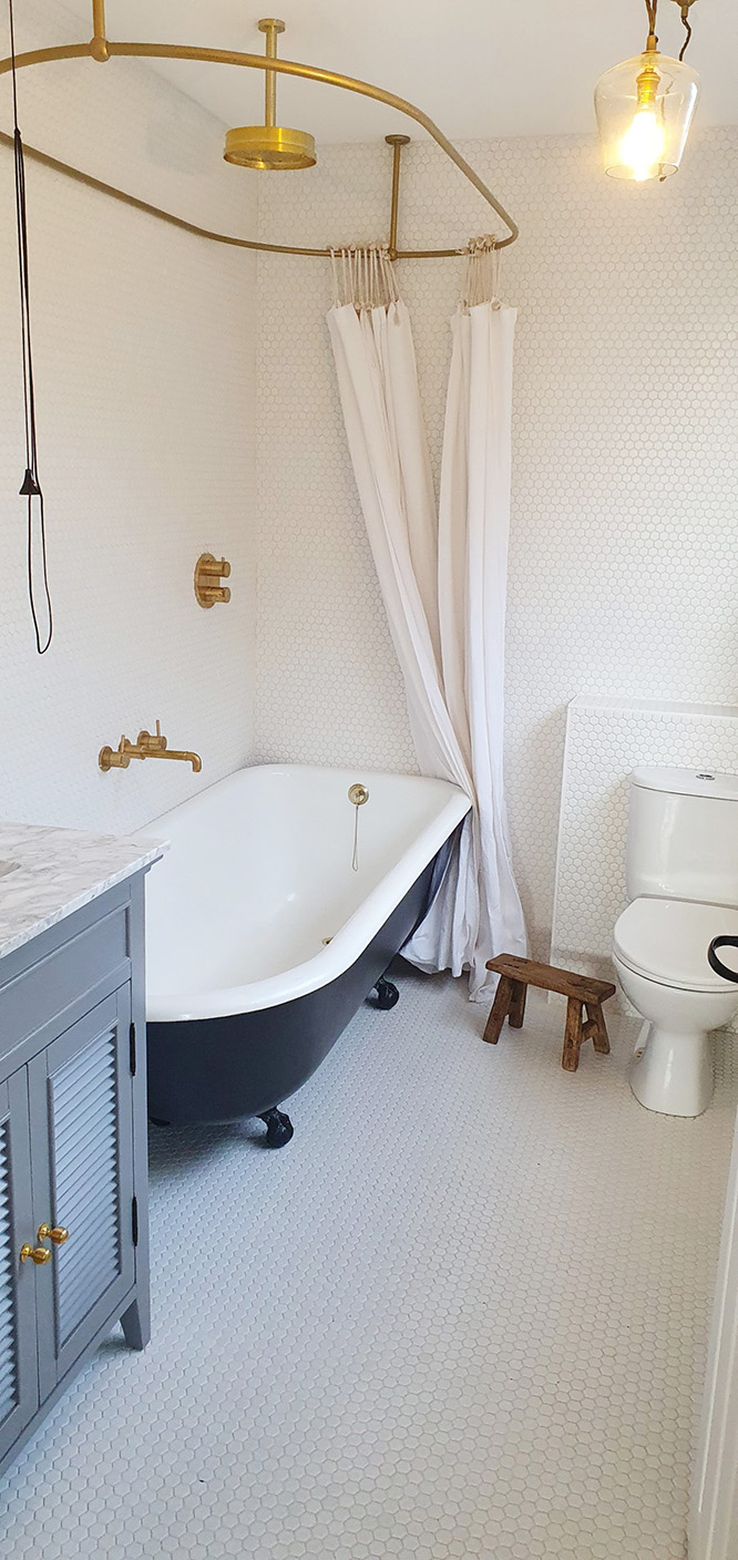 Halton Property Services; White Bathroom with Roll Top Bath