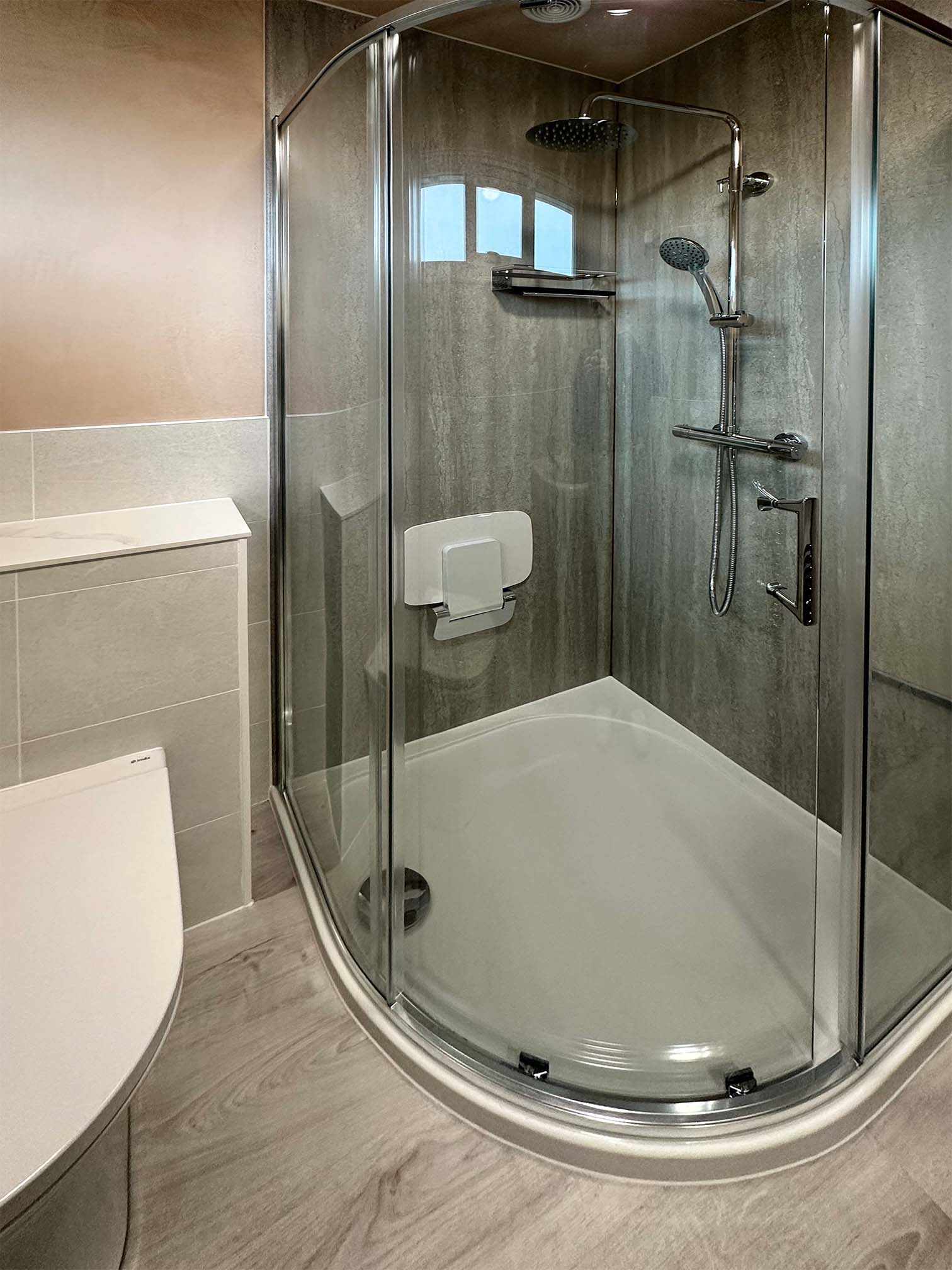 Halton Property Services; Large Shower Enclosure, Shower Panel Wall Coverings and Folding Shower Seat for Accessibility