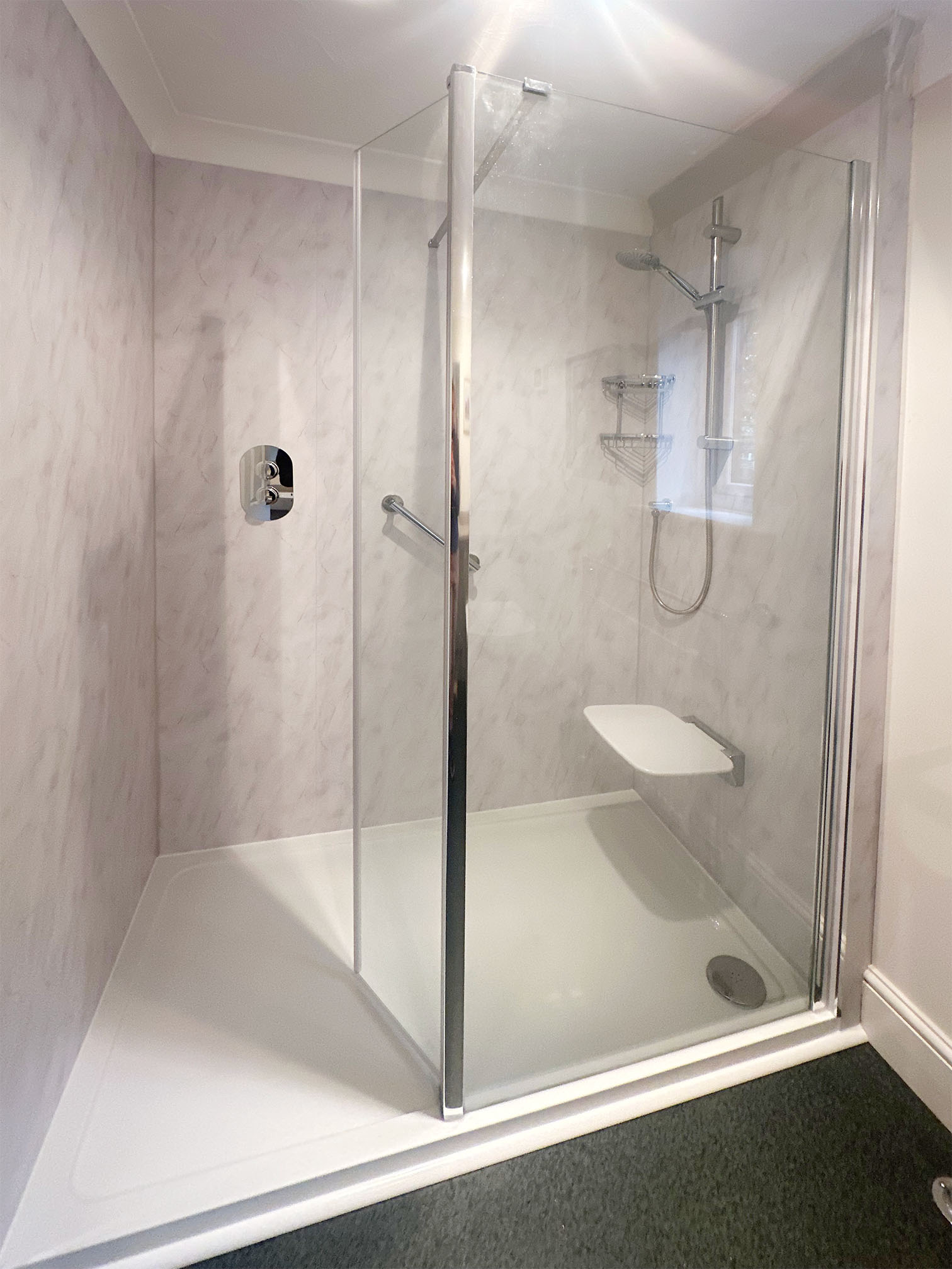 Halton Property Services; Large Shower Enclosure, Shower Panel Wall Coverings and Folding Shower Seat for Accessibility